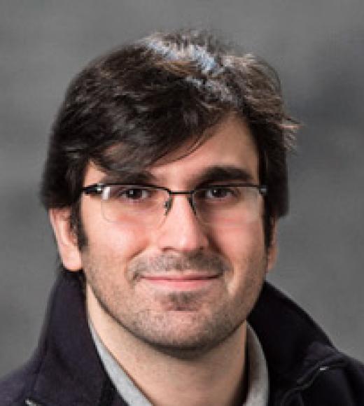 Headshot of Eduardo da Silva Neto