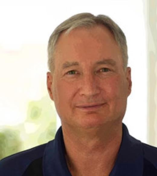 Headshot of John Rundle