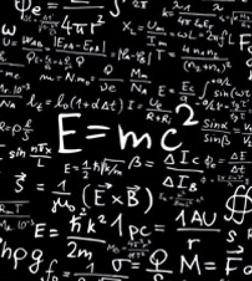 Formulae and equations on a chalkboard background, including E=mc² prominently displayed.
