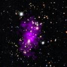 A false-color combination of optical and X-ray emission from the Champagne Galaxy cluster
